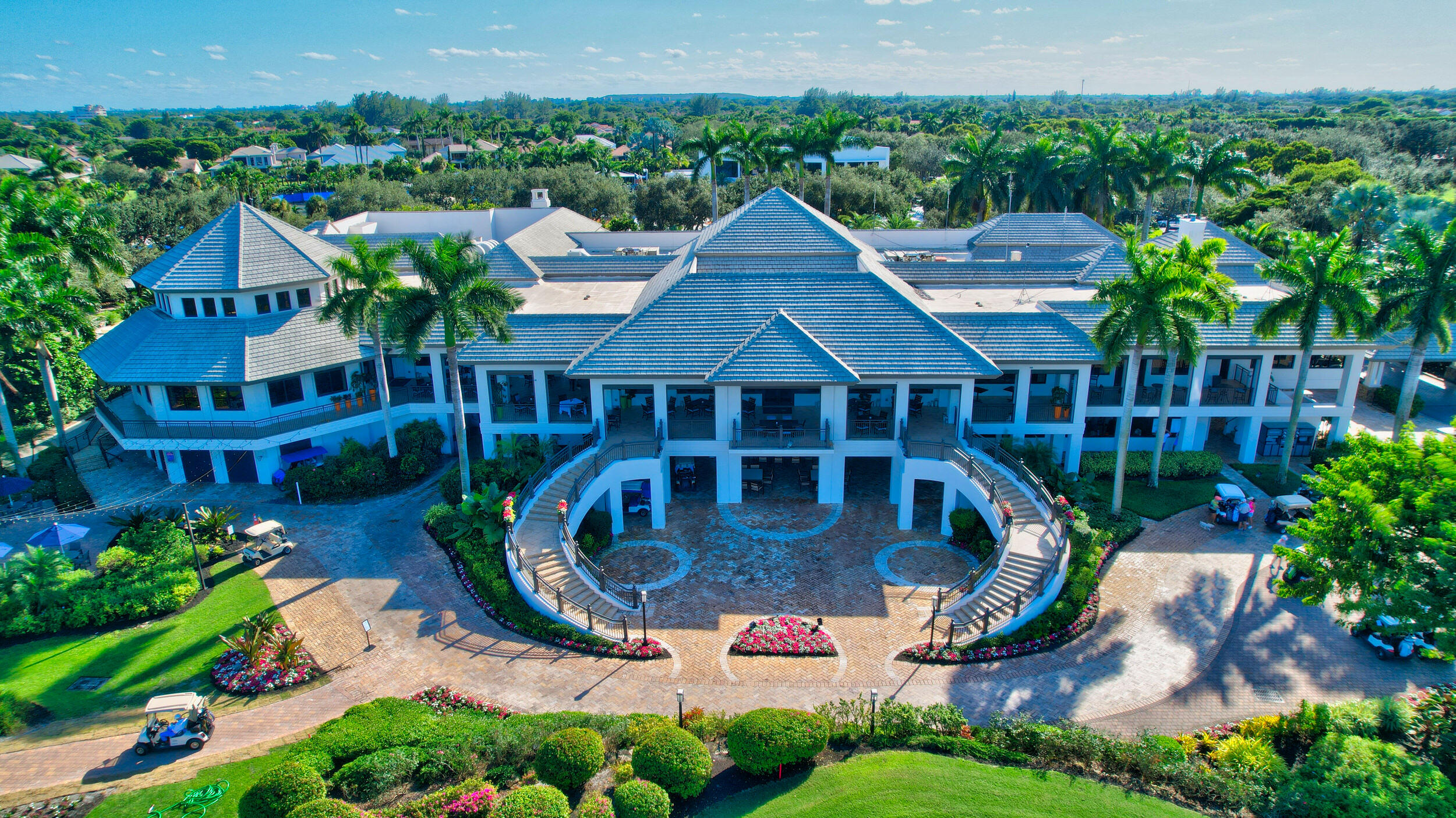7208 Valencia Drive Boca Raton, FL 33433 - Photo 69 of 73 a aerial view of a house with a yard table and chairs
