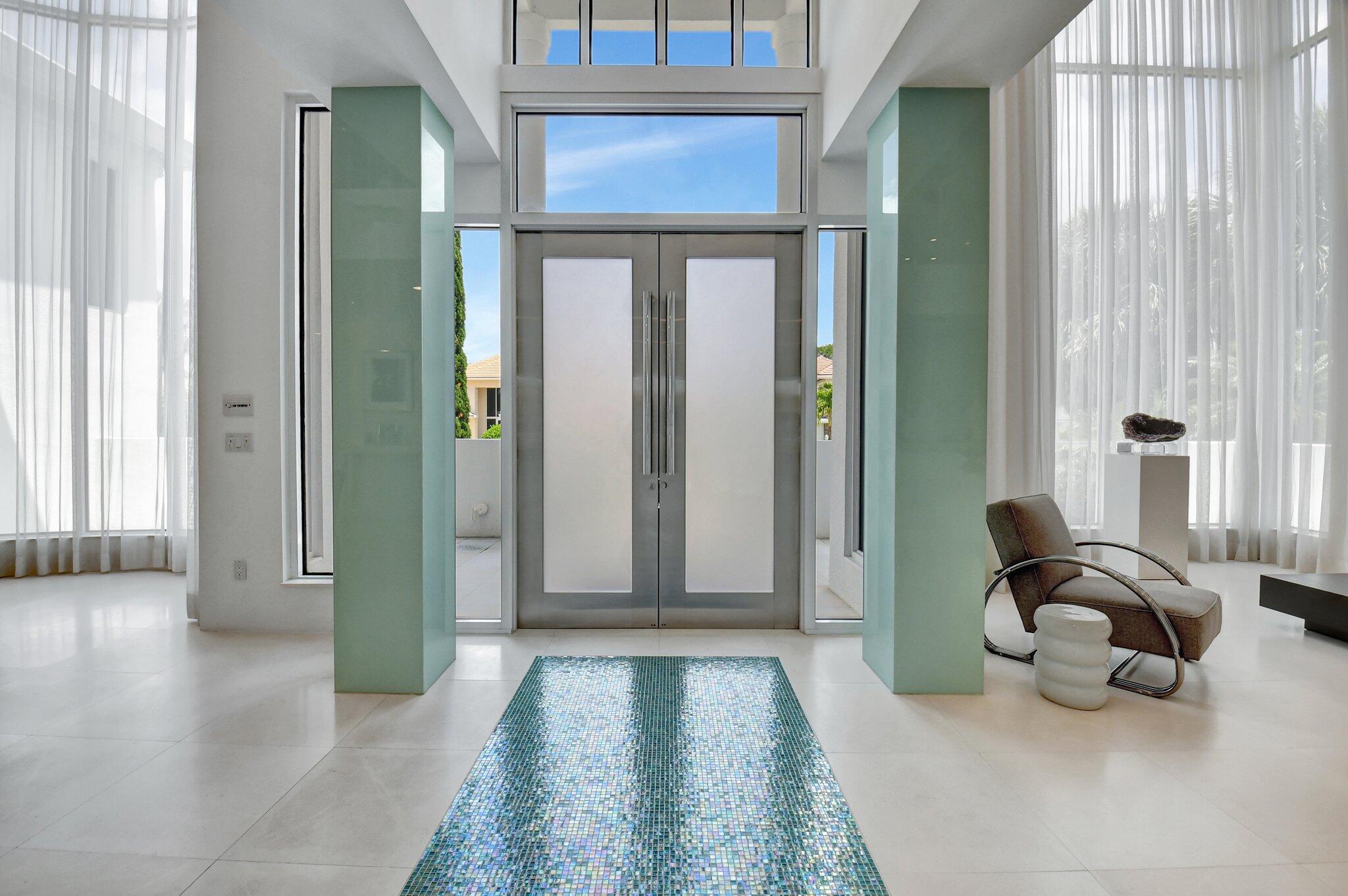 7208 Valencia Drive Boca Raton, FL 33433 - Photo 7 of 73 a view of a livingroom with entryway and furniture