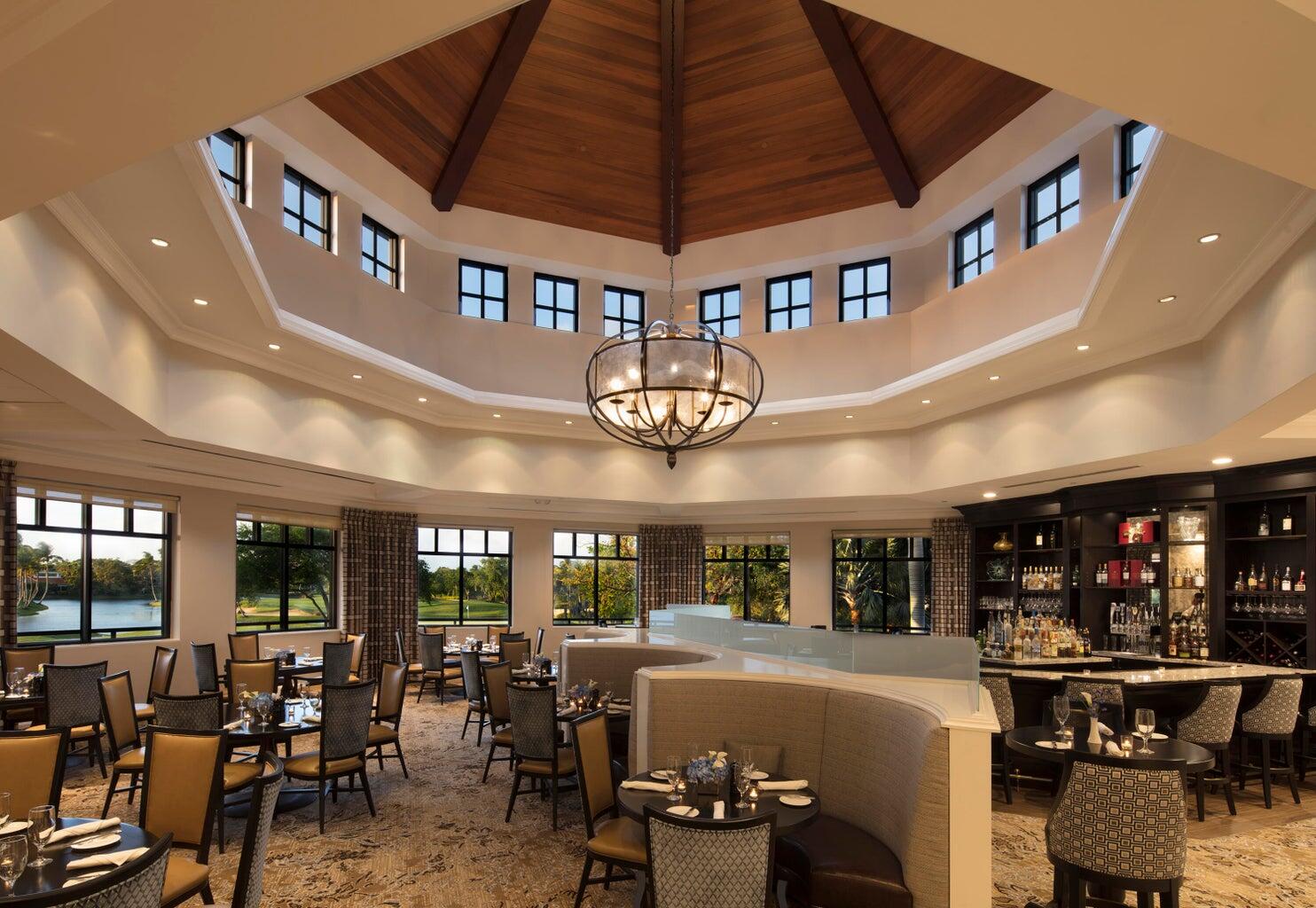 7208 Valencia Drive Boca Raton, FL 33433 - Photo 71 of 73 a living room with lots of furniture and chandelier