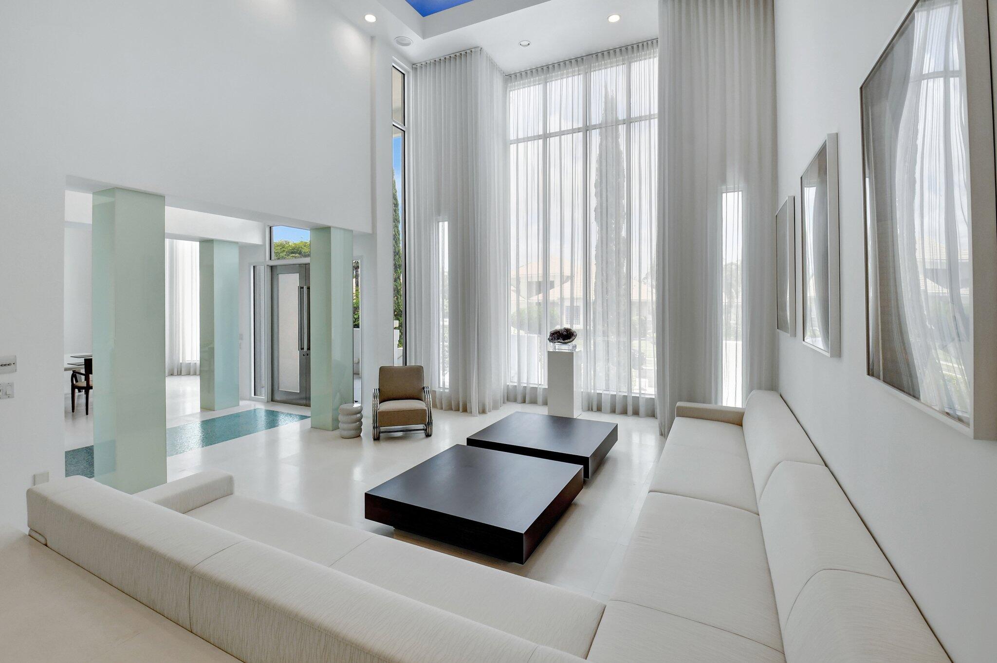 7208 Valencia Drive Boca Raton, FL 33433 - Photo 9 of 73 a living room with furniture and a large window