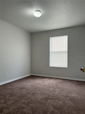 a view of a room with an empty space