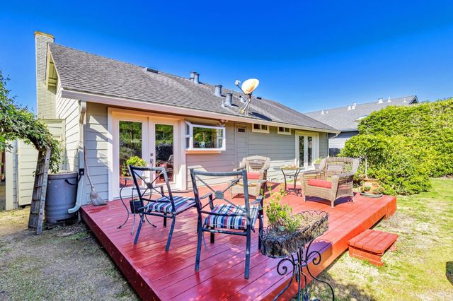 a front view of a house with swimming pool