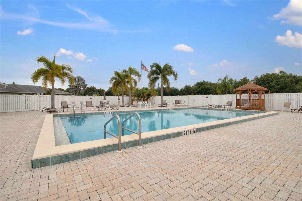 25225 Rampart Boulevard, Unit 1604 Punta Gorda, FL 33983 - Photo 28 of 41 a view of a swimming pool with a lake