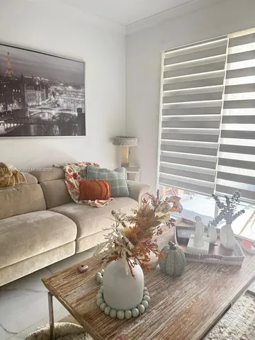 a kitchen with a sink cabinets and appliances