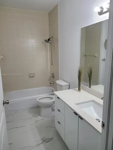 a view of a room that has a window in it