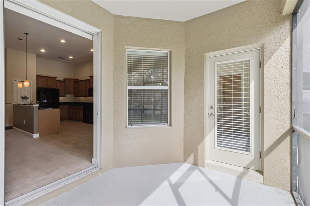 5832 Tarleton Way Mount Dora, FL 32757 - Photo 28 of 31 a living room with a large bed and furniture