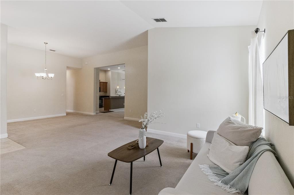 5832 Tarleton Way Mount Dora, FL 32757 - Photo 5 of 31 a living room with furniture and a window