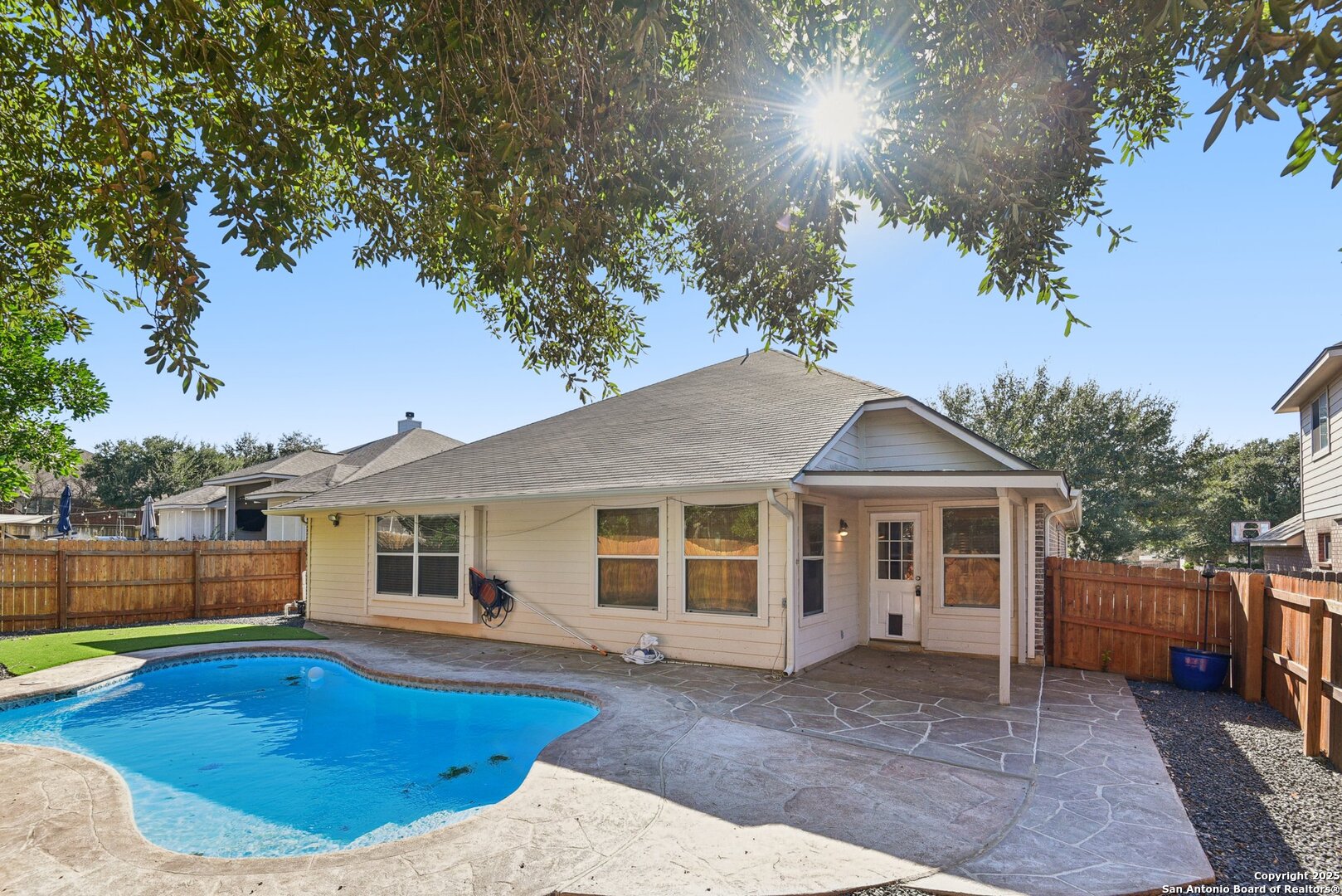 112 Storm Mountain Cibolo, TX 78108 - Photo 1 of 34 a house with swimming pool in front of it