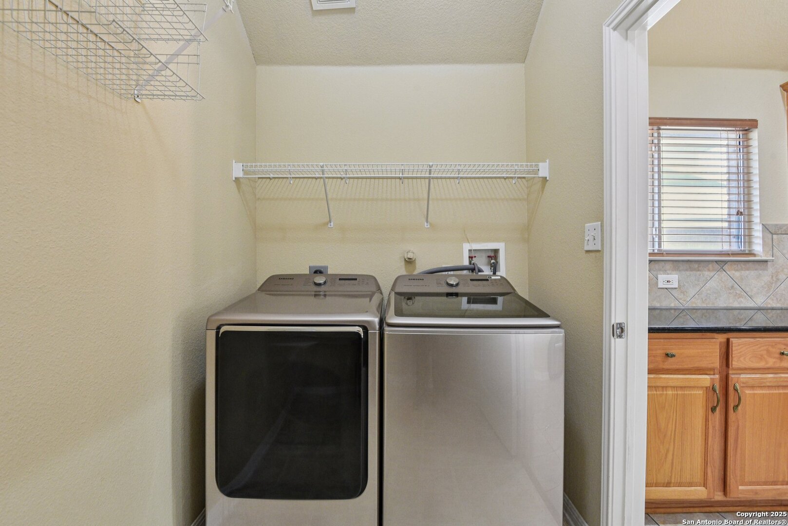 112 Storm Mountain Cibolo, TX 78108 - Photo 32 of 34 a utility room with dryer and washer