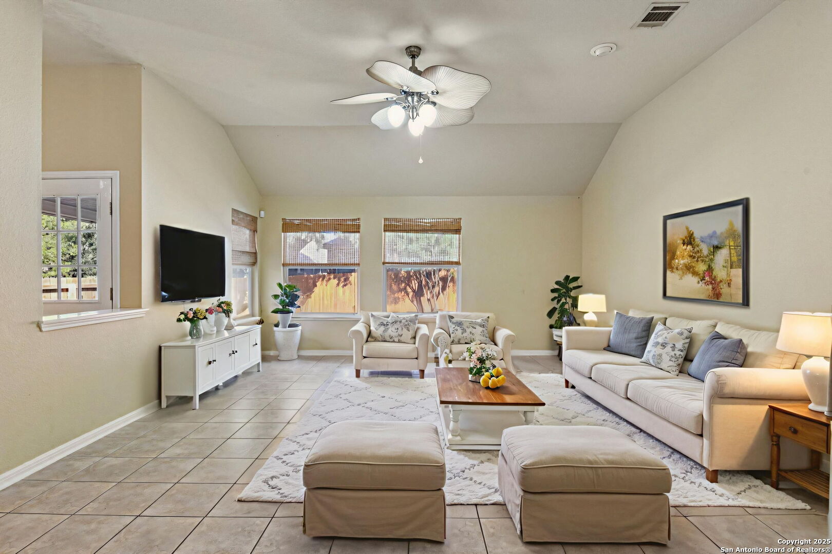 112 Storm Mountain Cibolo, TX 78108 - Photo 8 of 34 a living room with furniture or chandelier and a flat screen tv