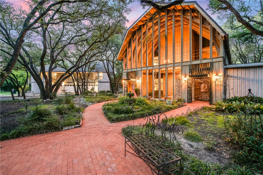 a backyard of a house with lots of green space
