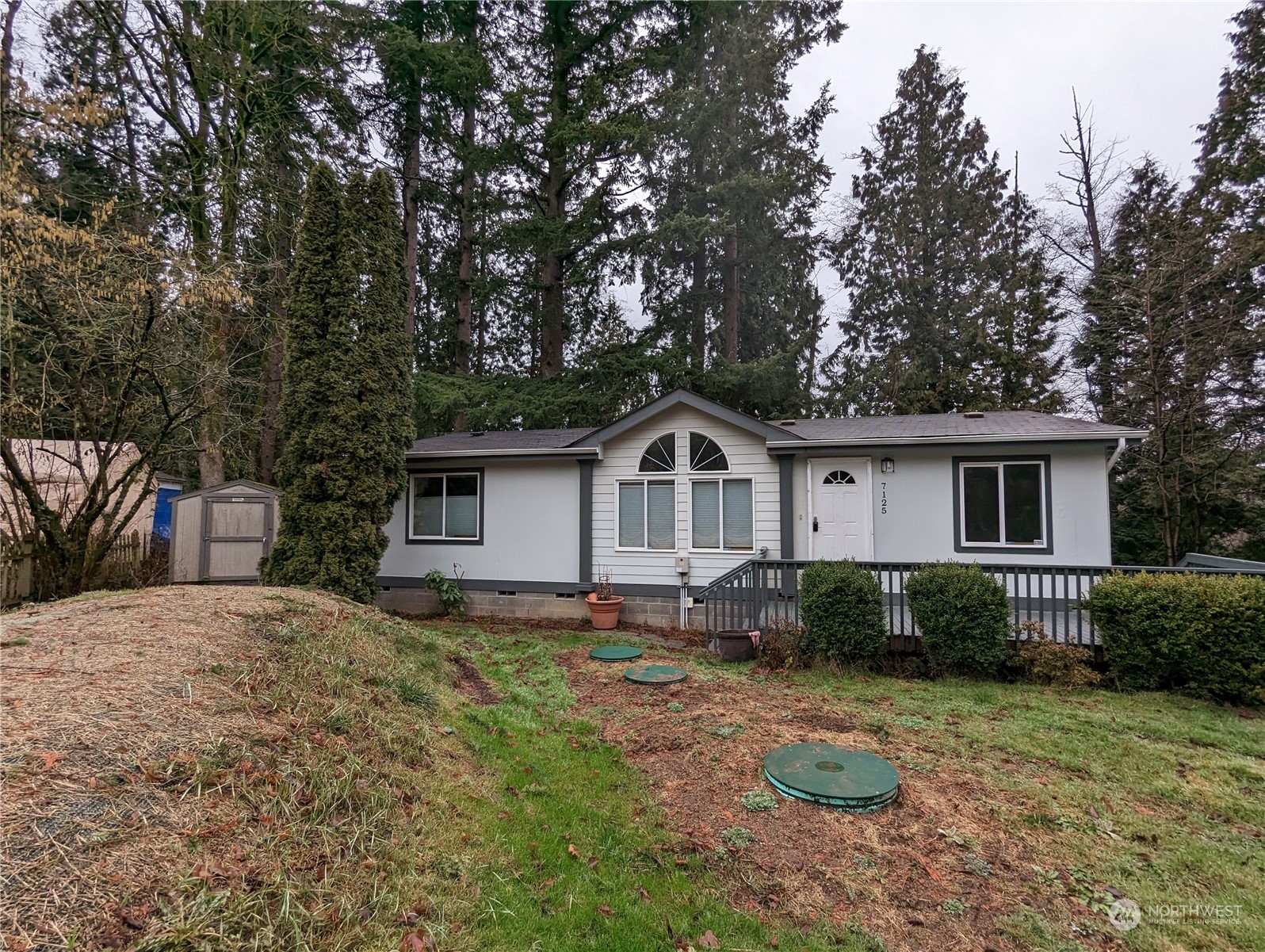 7125 Valley View Road Ferndale, WA 98248 - Photo 1 of 1 a front view of a house with garden