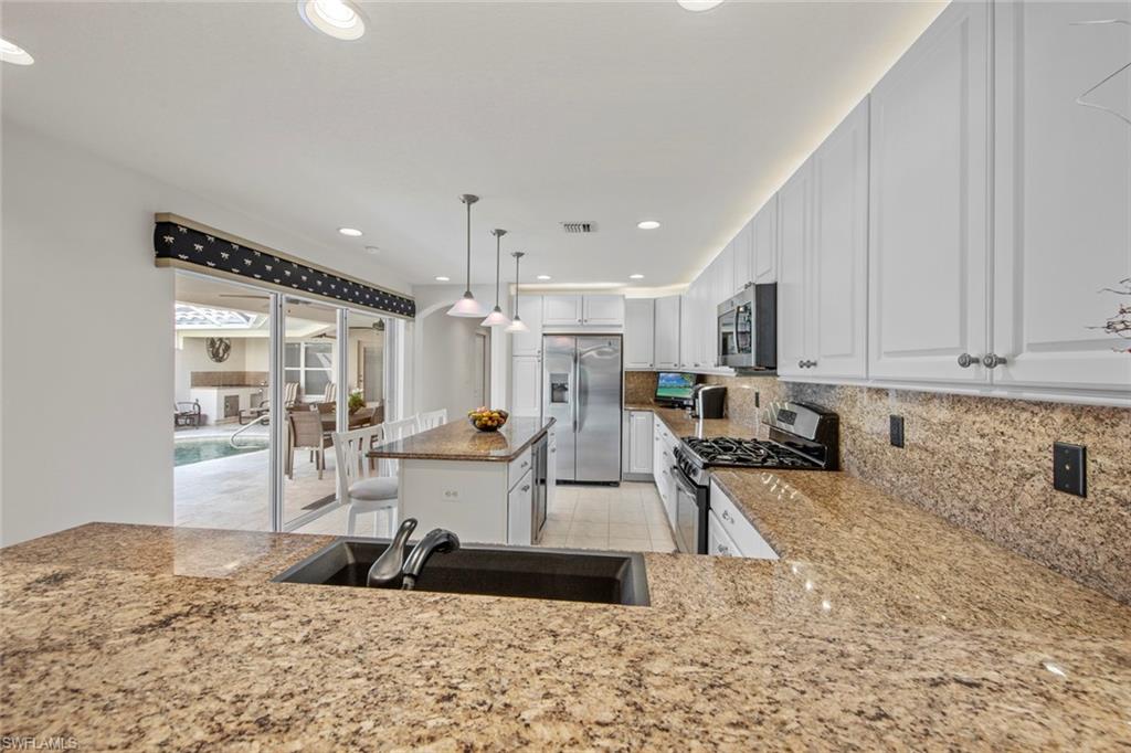 9046 Astonia Way Estero, FL 33967 - Photo 19 of 47 a living room with furniture