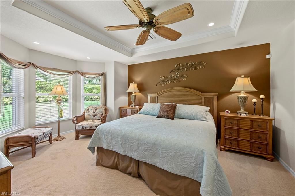 9046 Astonia Way Estero, FL 33967 - Photo 24 of 47 a bedroom with bed and window