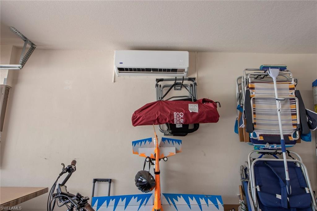 9046 Astonia Way Estero, FL 33967 - Photo 35 of 47 a view of a room with gym equipment