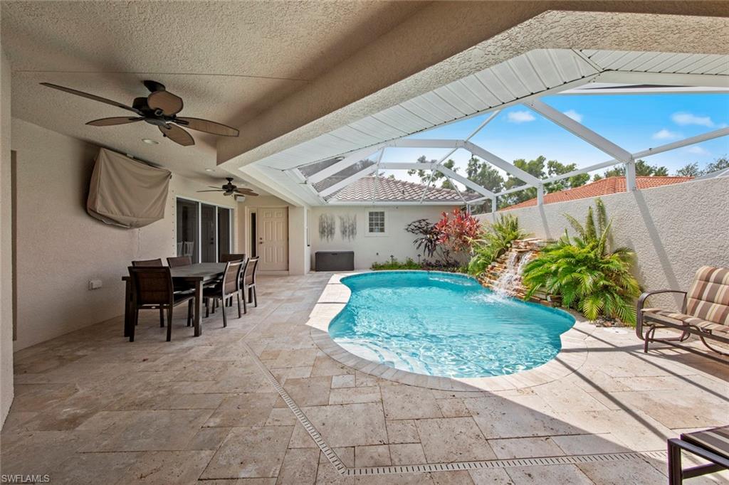 9046 Astonia Way Estero, FL 33967 - Photo 4 of 47 a view of a chairs and table in a patio
