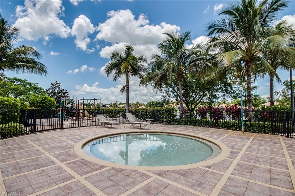 9046 Astonia Way Estero, FL 33967 - Photo 43 of 47 a view of a backyard space with palm trees