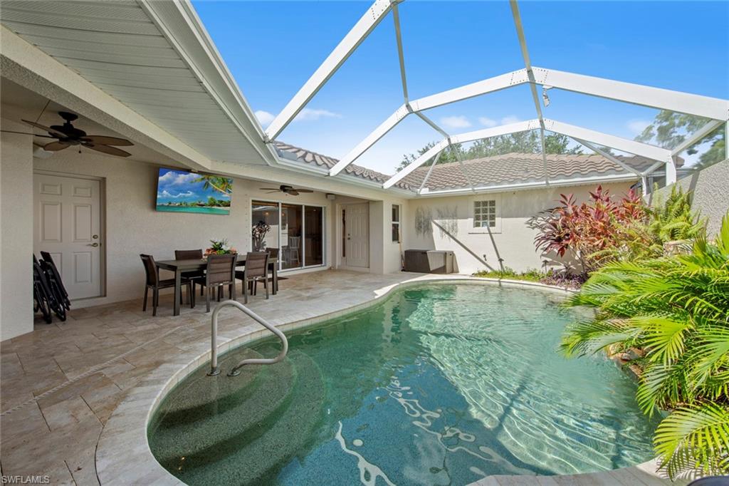 9046 Astonia Way Estero, FL 33967 - Photo 10 of 47 a room with lots of potted plants