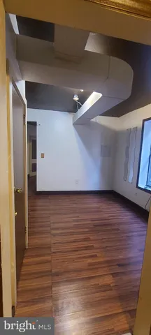 a kitchen with stainless steel appliances a sink stove and cabinets