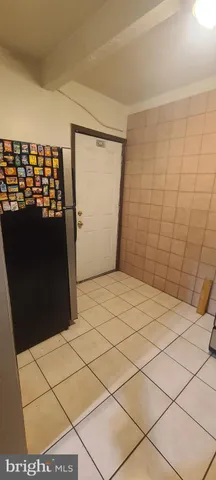 a kitchen with a cabinets and a stove top oven