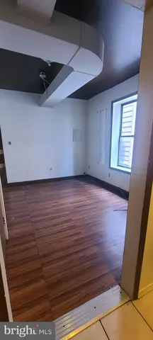 a bathroom with a toilet a sink and shower