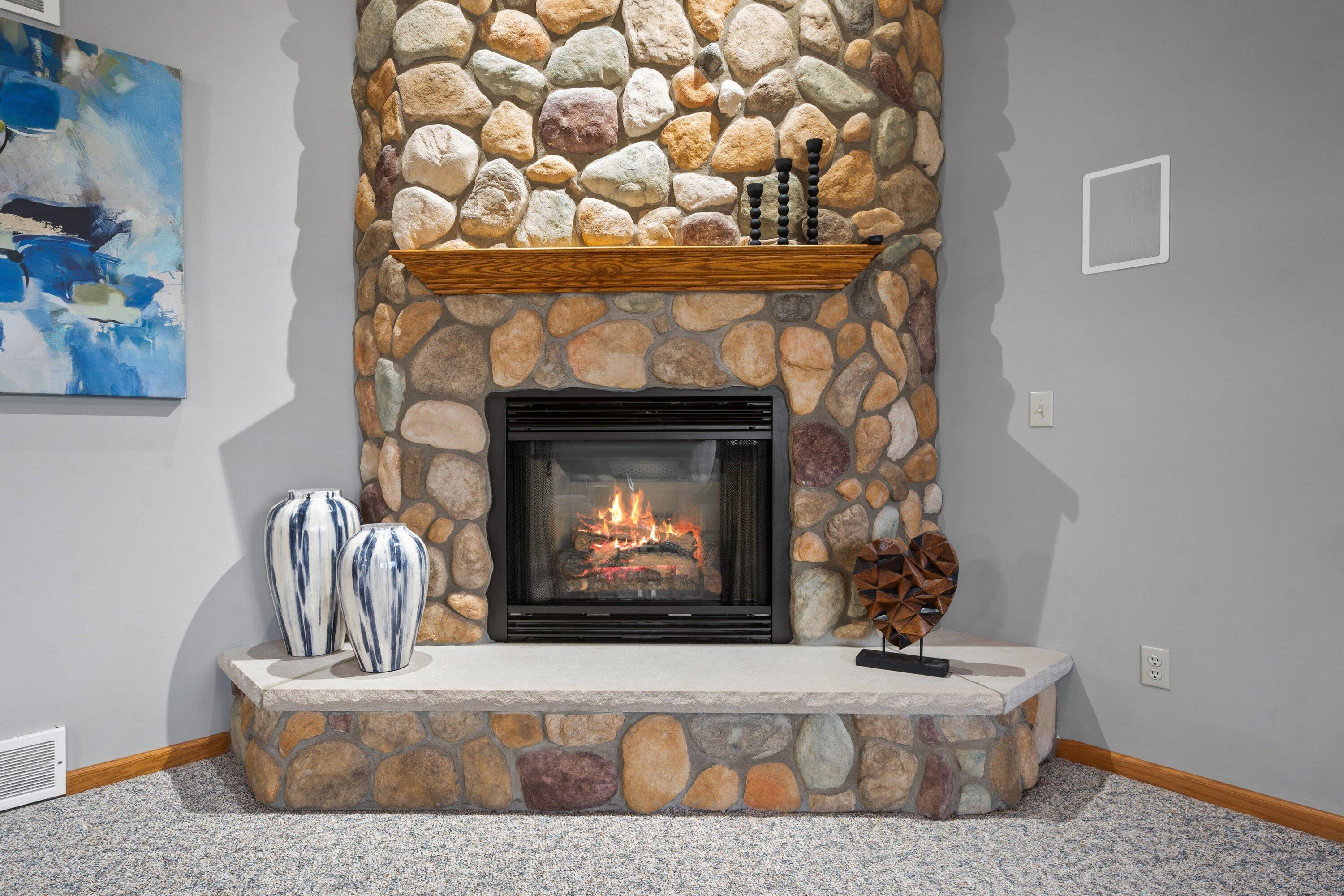 439 92nd Street Raymond, WI 53126 - Photo 14 of 40 Cultured stone fireplace