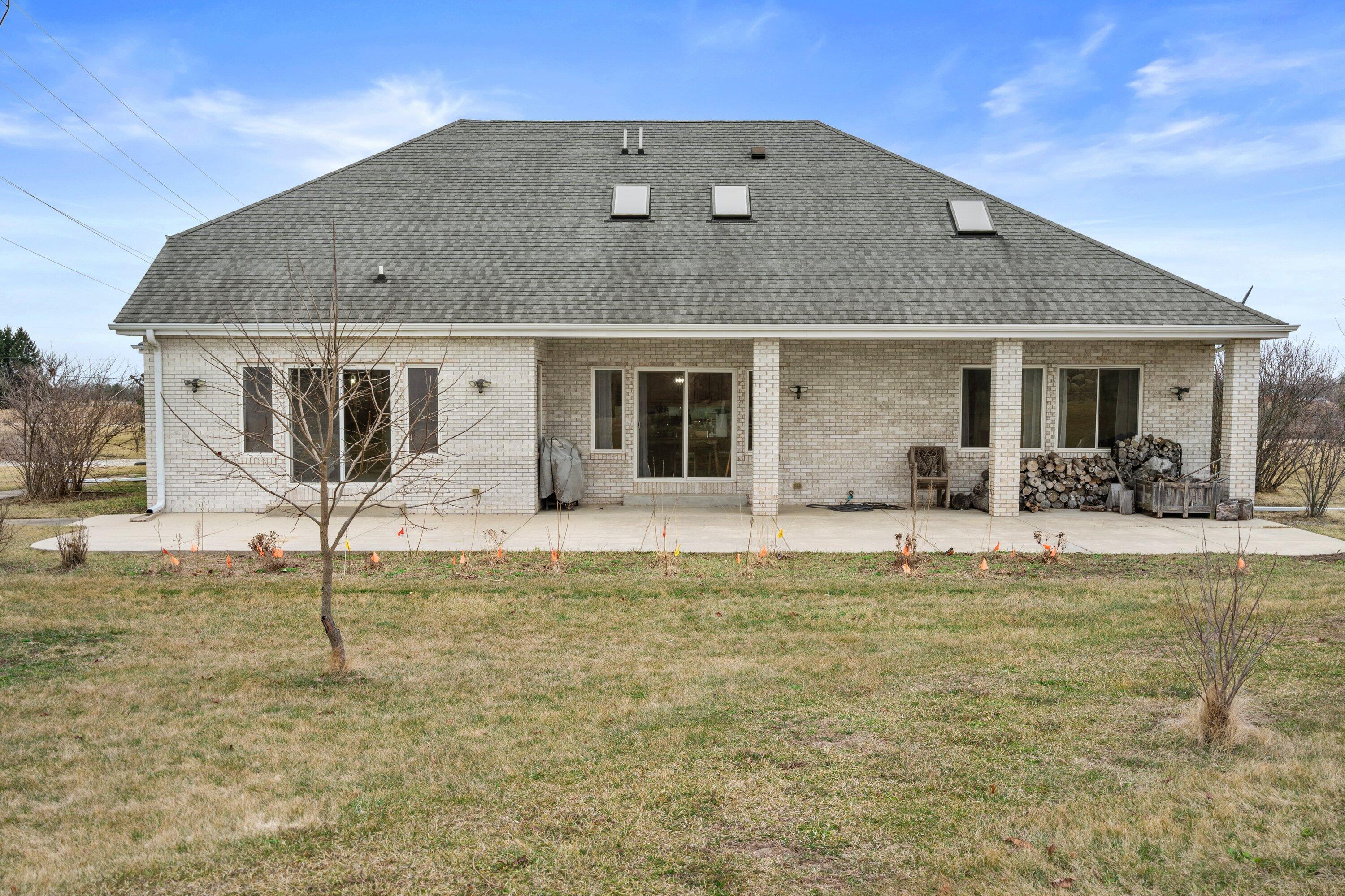 439 92nd Street Raymond, WI 53126 - Photo 32 of 40 Huge patio area