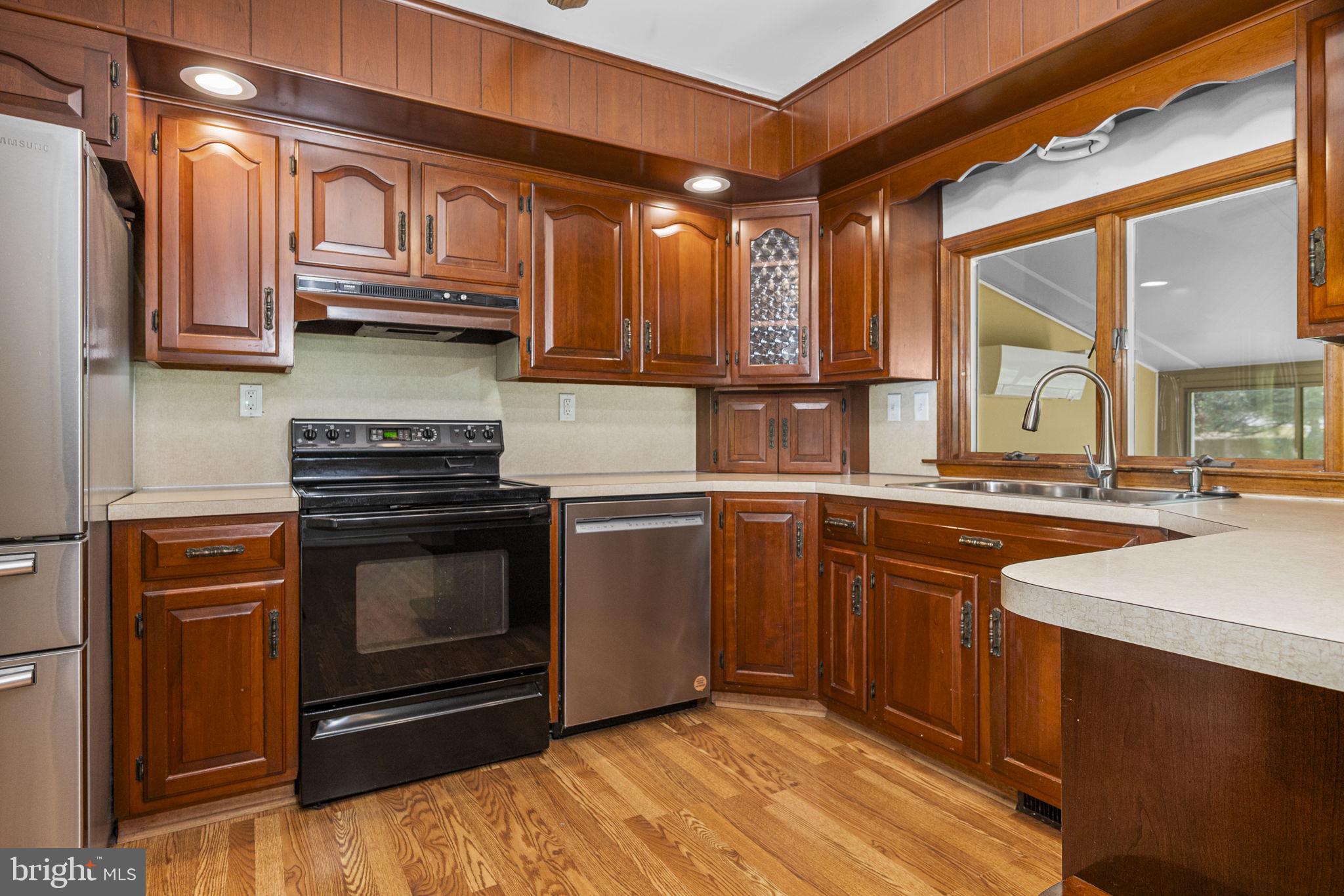 304 Crump Road Exton, PA 19341 - Photo 11 of 30 Warm wooden kitchen with modern touches.