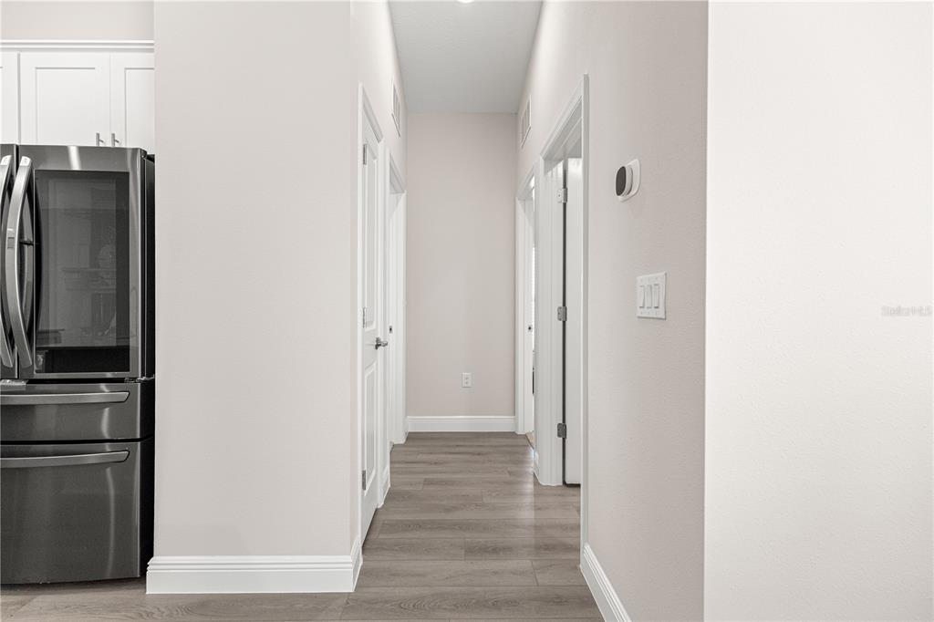9611 Southwest 62nd Court Ocala, FL 34476 - Photo 12 of 41 a view of a kitchen from the hallway