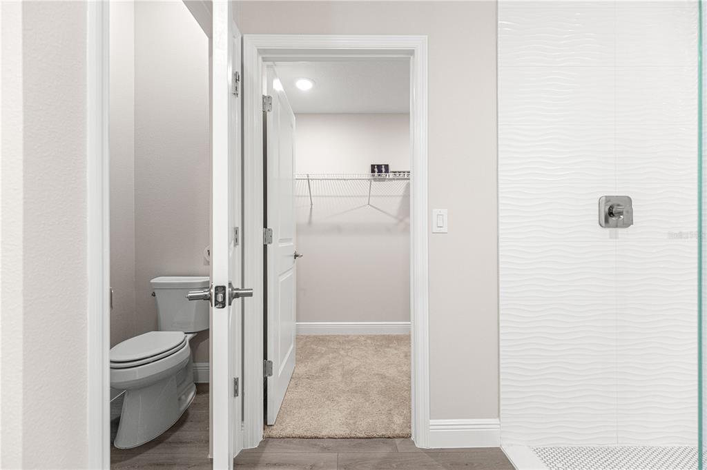 9611 Southwest 62nd Court Ocala, FL 34476 - Photo 22 of 41 a bathroom with a granite countertop shower