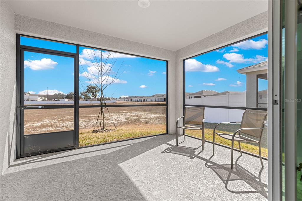 9611 Southwest 62nd Court Ocala, FL 34476 - Photo 26 of 41 a view of a large window with an outdoor space