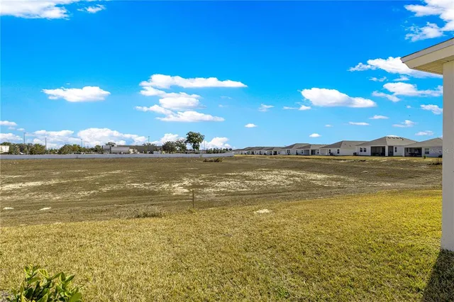 a view of an outdoor space yard patio fire pit and outdoor kitchen