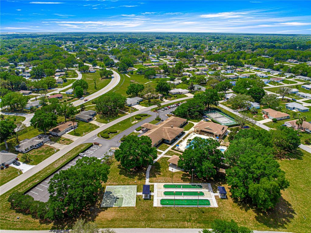 9611 Southwest 62nd Court Ocala, FL 34476 - Photo 37 of 41 an aerial view of residential houses with outdoor space and trees