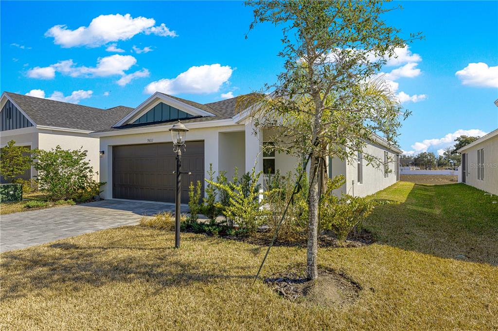 9611 Southwest 62nd Court Ocala, FL 34476 - Photo 40 of 41 a view of a house with a yard