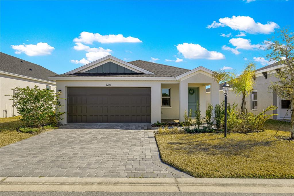 9611 Southwest 62nd Court Ocala, FL 34476 - Photo 41 of 41 a front view of a house with a yard