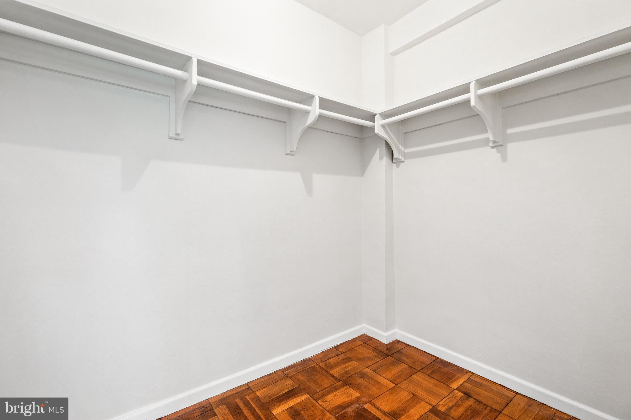 4100 W Street Northwest, Unit 306 Washington, DC 20007 - Photo 12 of 23 a view of a room with racks on the wall
