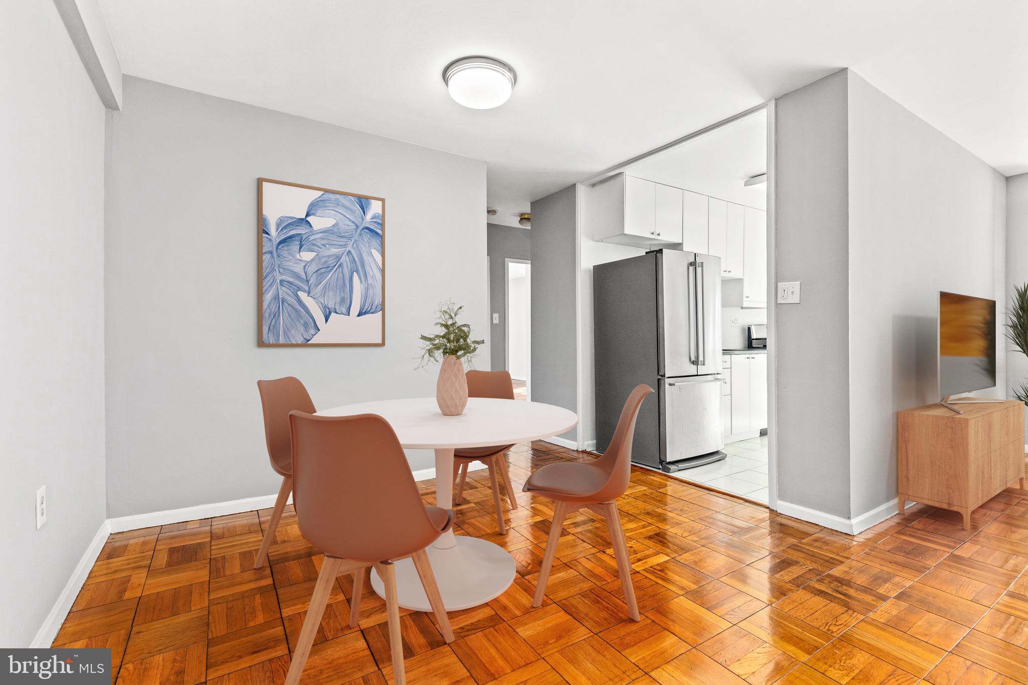 4100 W Street Northwest, Unit 306 Washington, DC 20007 - Photo 5 of 23 a view of a dining room with furniture