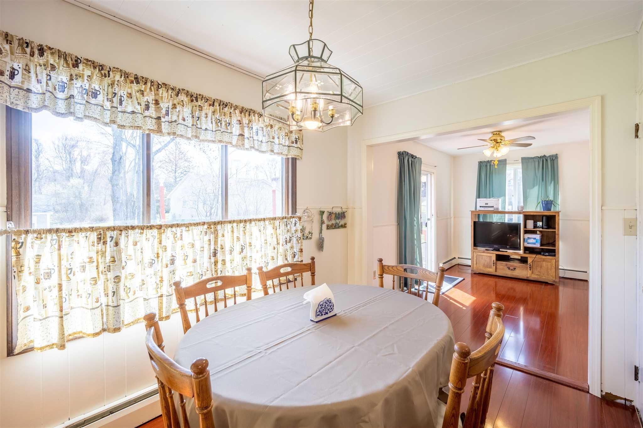 137 Bart Drive La Grange, NY 12603 - Photo 13 of 30 a view of a dining room with furniture window and outside view