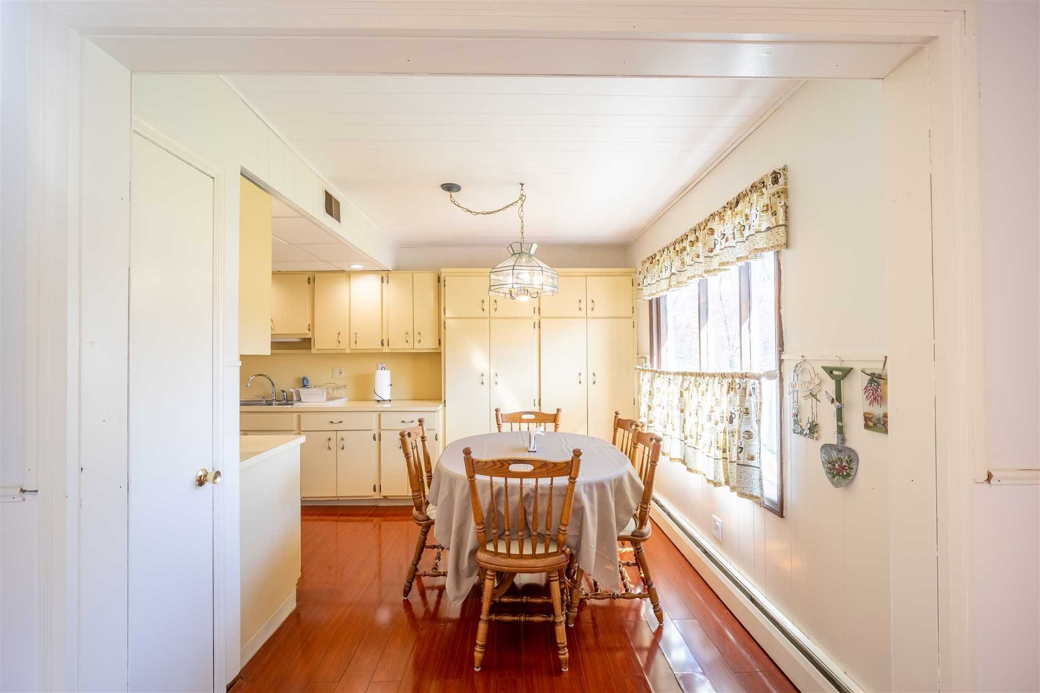 137 Bart Drive La Grange, NY 12603 - Photo 14 of 30 a view of a dining room with furniture window and wooden floor