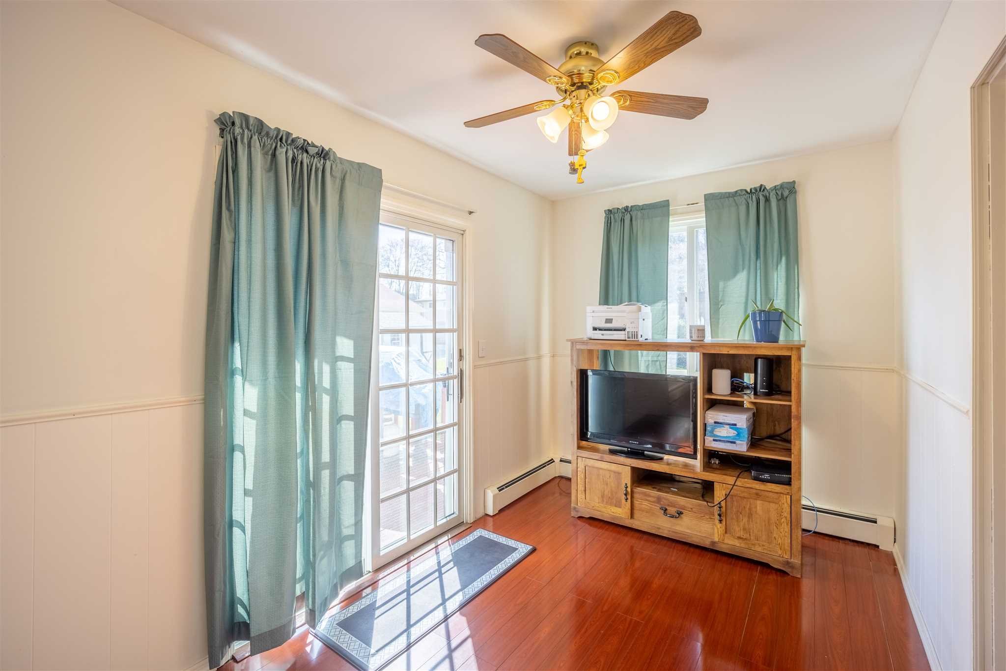 137 Bart Drive La Grange, NY 12603 - Photo 15 of 30 a living room with furniture and a flat screen tv