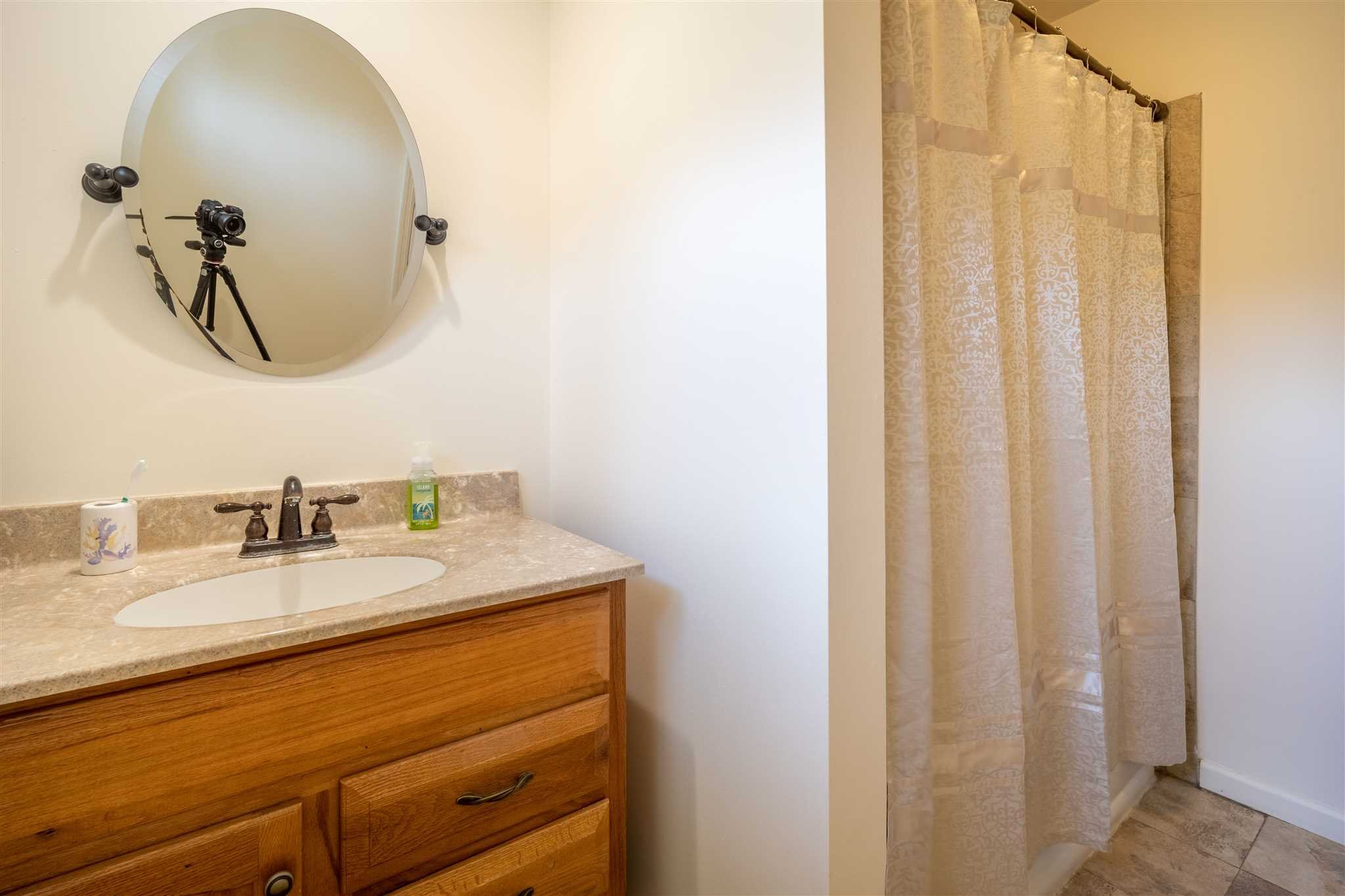 137 Bart Drive La Grange, NY 12603 - Photo 19 of 30 a bathroom with a granite countertop sink and a mirror