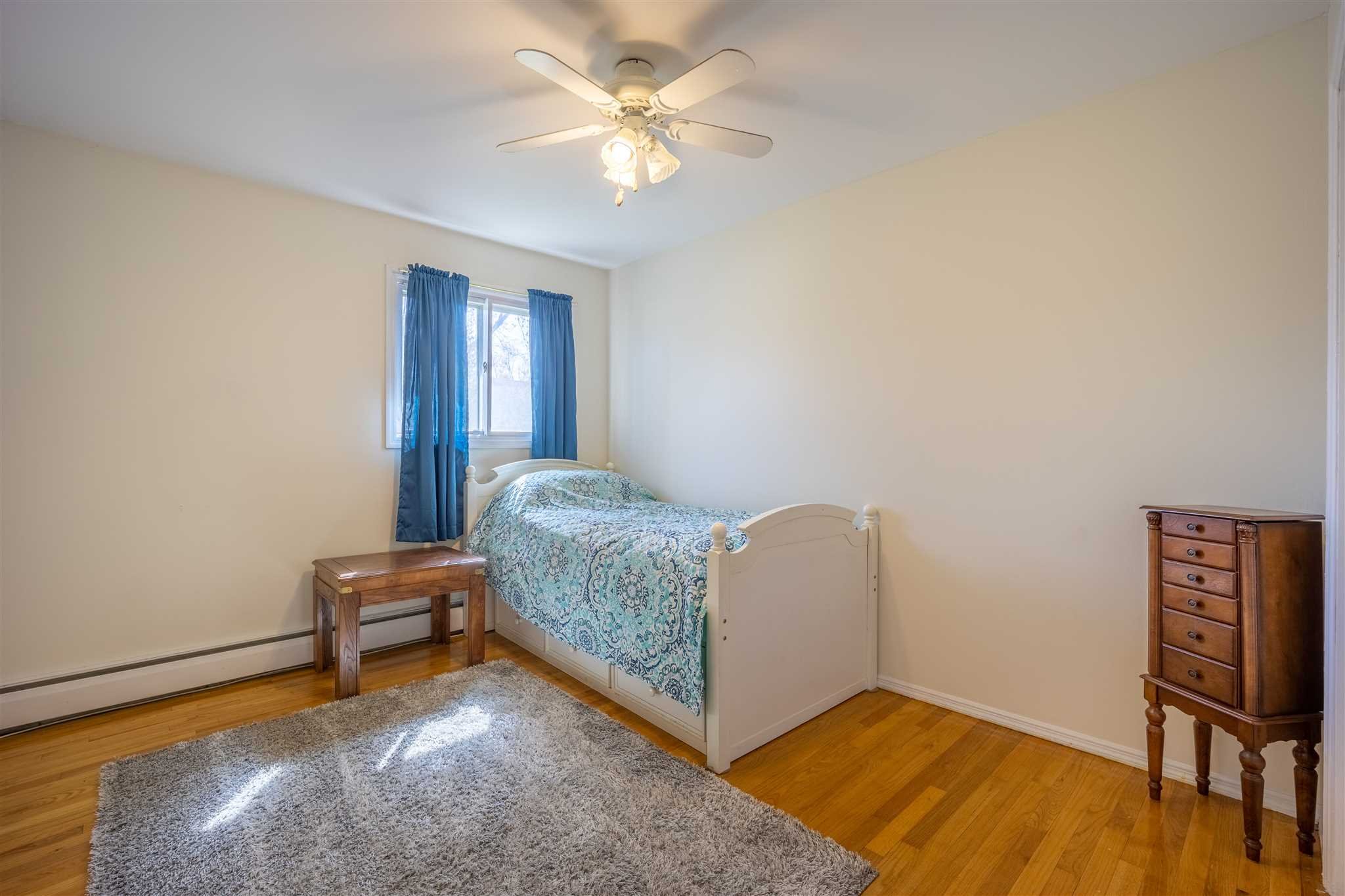 137 Bart Drive La Grange, NY 12603 - Photo 20 of 30 a living room with furniture and a ceiling fan