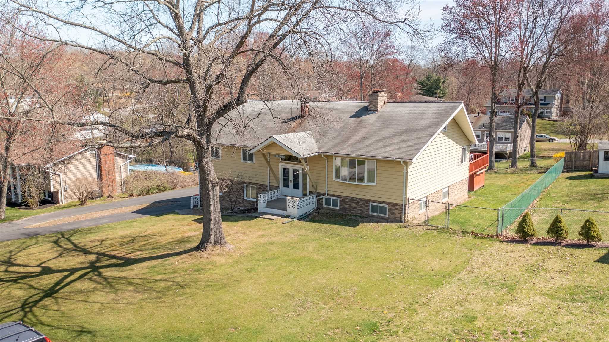 137 Bart Drive La Grange, NY 12603 - Photo 2 of 30 a view of a house with snow on the side of the road