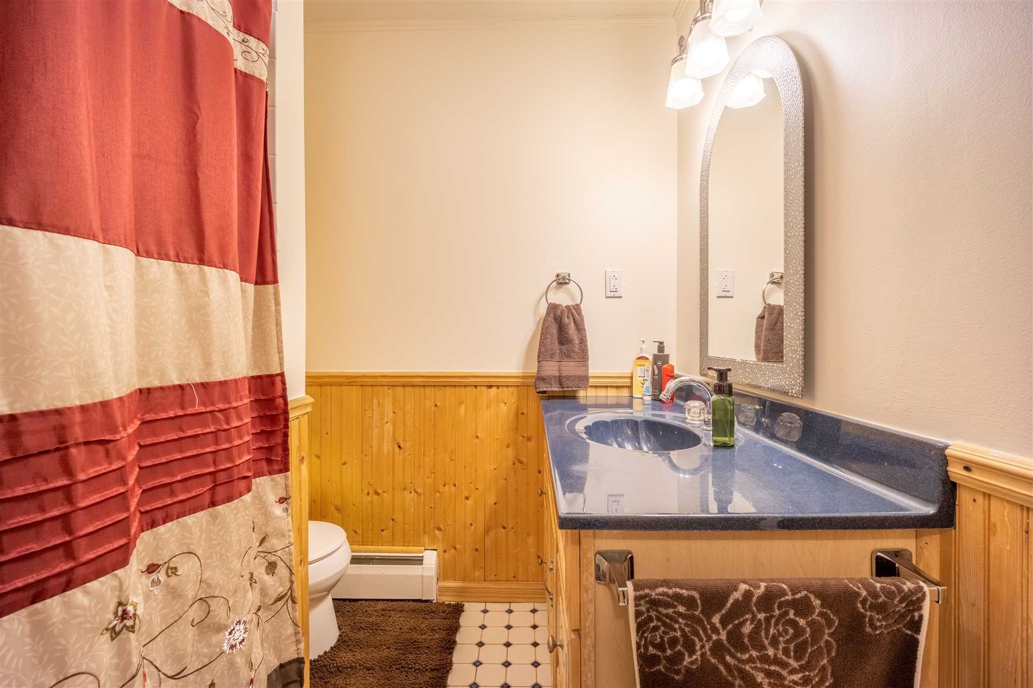 137 Bart Drive La Grange, NY 12603 - Photo 22 of 30 a bathroom with a sink and a mirror