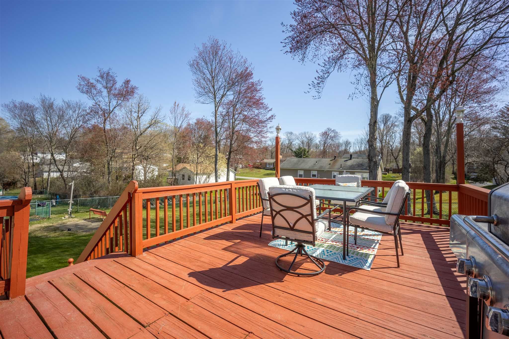 137 Bart Drive La Grange, NY 12603 - Photo 27 of 30 a view of a patio with wooden floor table and chairs
