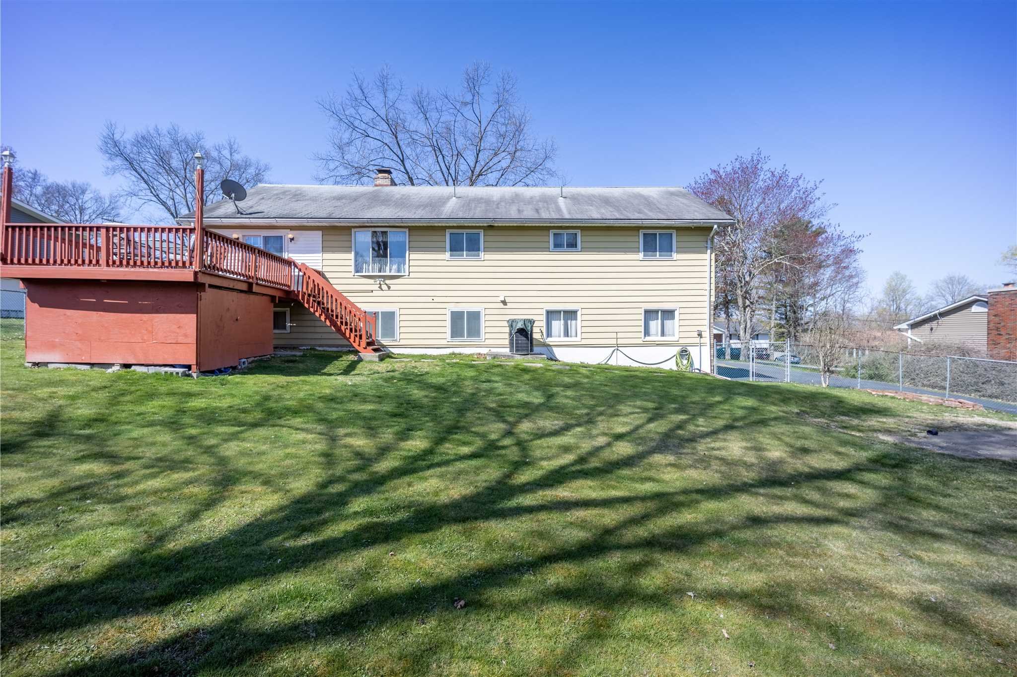 137 Bart Drive La Grange, NY 12603 - Photo 28 of 30 a front view of house with yard and green space