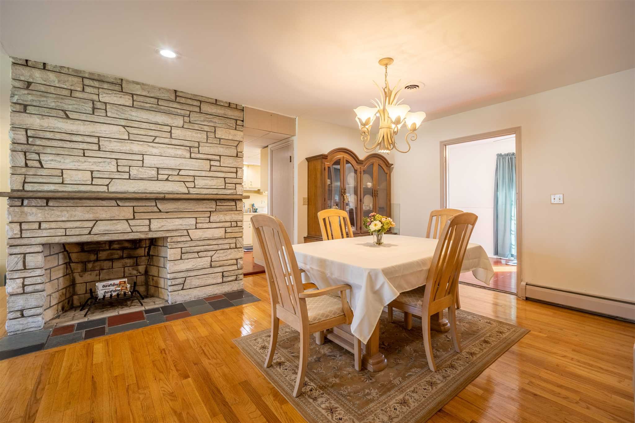 137 Bart Drive La Grange, NY 12603 - Photo 8 of 30 a view of a a dining room with furniture window and wooden floor