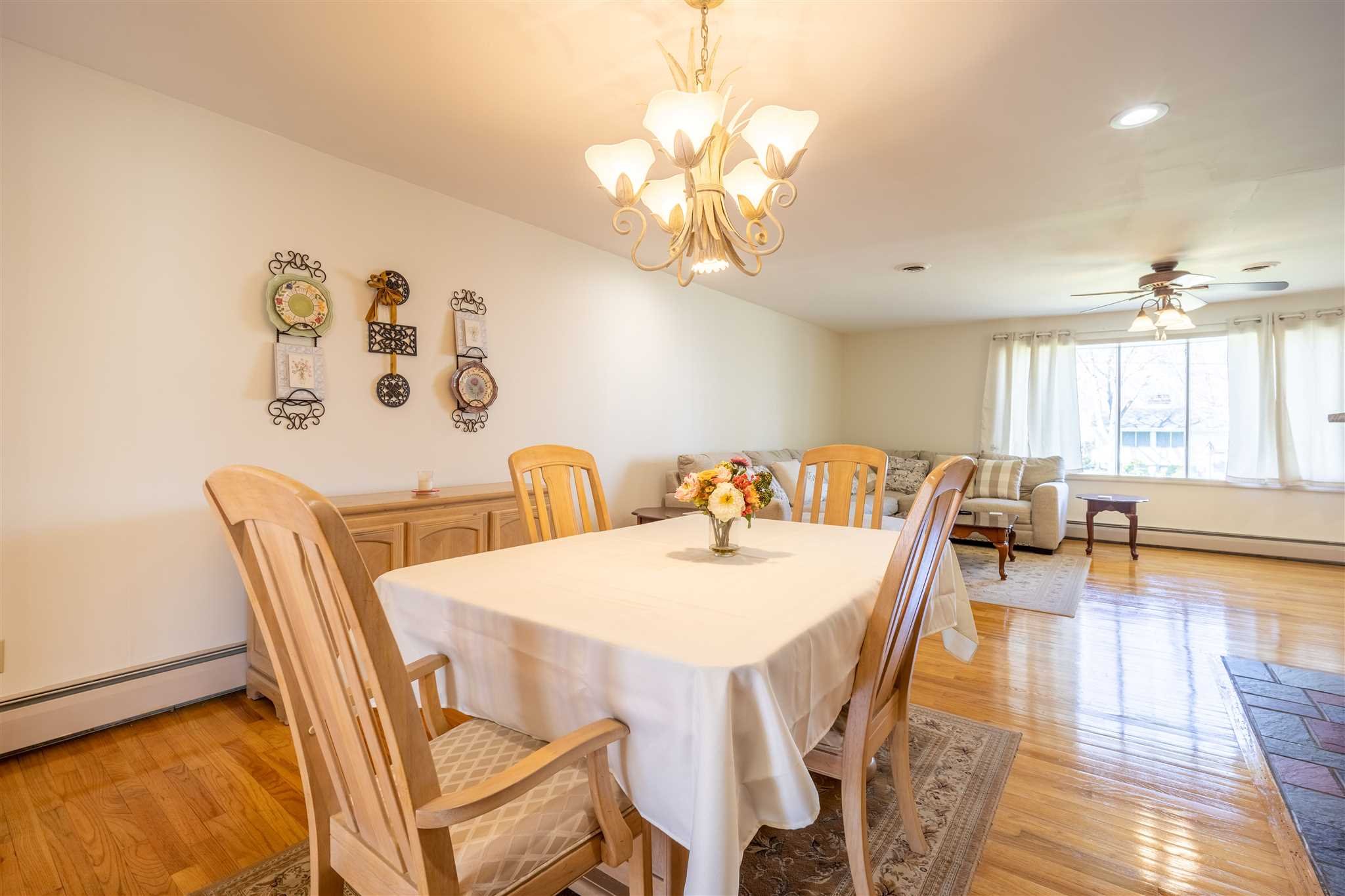 137 Bart Drive La Grange, NY 12603 - Photo 9 of 30 a view of a dining room with furniture window and wooden floor
