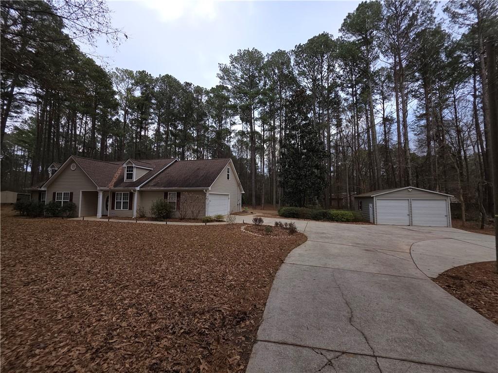 1180 North Ola Road McDonough, GA 30252 - Photo 47 of 47 front view of a house with a yard