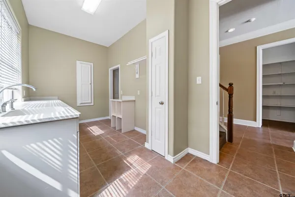 a view of a bathroom from the hallway